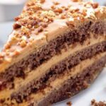Chilean mocha cream cake layered with manjar and decorated with walnuts