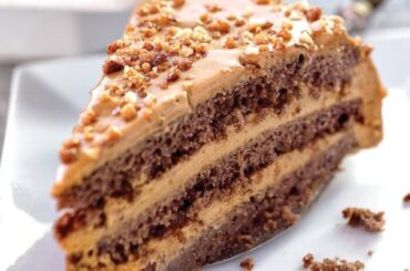 Chilean mocha cream cake layered with manjar and decorated with walnuts