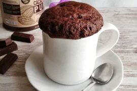 Chocolate microwave mug cake, ready and warm, straight out of the microwave.