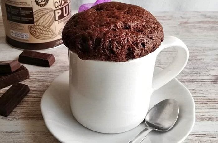 Chocolate microwave mug cake, ready and warm, straight out of the microwave.