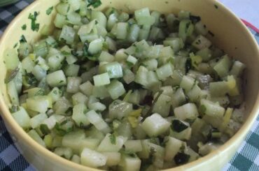 Chilean nalca pebre with diced nalca stalk, cilantro, and merken in a bowl