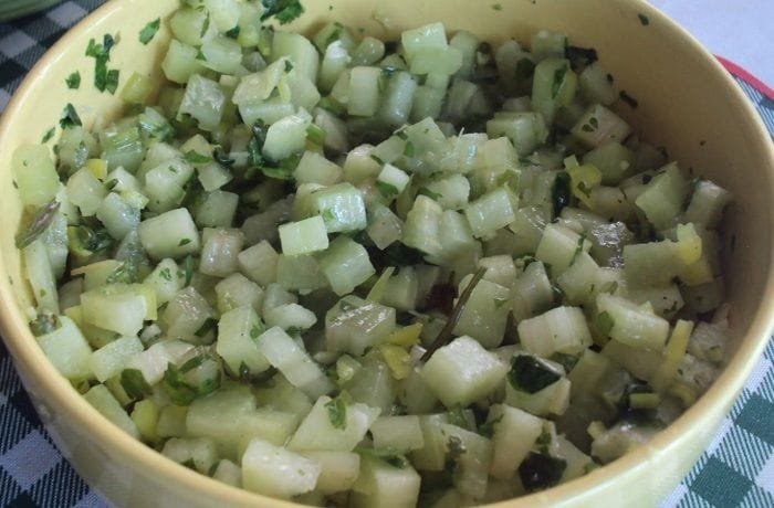 Chilean nalca pebre with diced nalca stalk, cilantro, and merken in a bowl