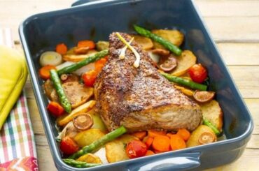 Chilean oven roast beef sliced with golden potatoes, onions, and red peppers