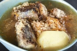 Chilean oxtail and cracked wheat soup with vegetables and whole potatoes