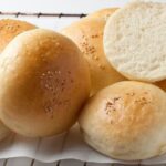 Chilean pan frica burger buns sprinkled with sesame seeds