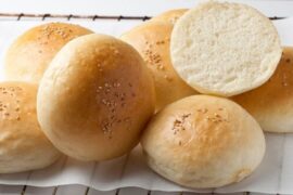 Chilean pan frica burger buns sprinkled with sesame seeds