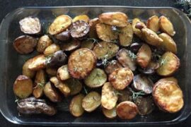 Native Chilote potatoes roasted with rosemary and merken, served as a side dish.