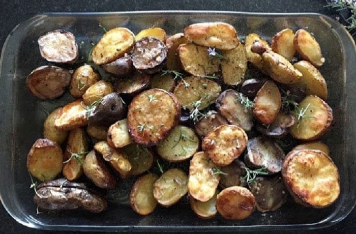 Native Chilote potatoes roasted with rosemary and merken, served as a side dish.