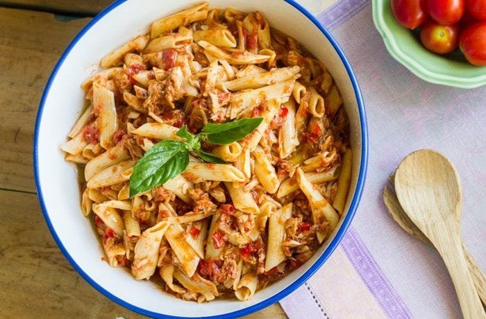Chilean pasta with canned jack mackerel tomato sauce topped with parsley