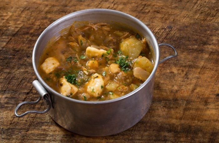 Chilean picante de guatitas y charqui, a thick Andean tripe and dried meat stew
