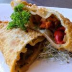 Golden, crisp fried Chilean piure empanadas filled with sea squirt and onion