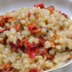 A deep plate of Chilean rice with piure, a seafood and rice stew.