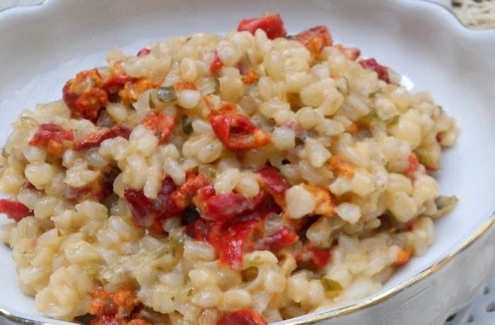 A deep plate of Chilean rice with piure, a seafood and rice stew.