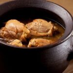 Chilean pollo al conac, flambeed chicken in a white wine and cognac sauce, a traditional dish.