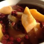 Ripe yellow quinces, whole and cut into wedges, for the quince and murta preserve