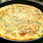 Chilean tortilla de arroz, a golden rice and egg omelette filled with ham and cheese