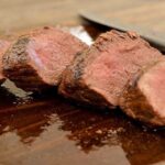 Chilean roasted beef tenderloin, sliced into medallions after resting.