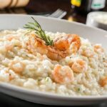 Creamy shrimp risotto with parmesan, garnished with parsley