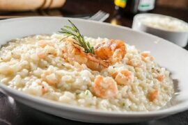 Creamy shrimp risotto with parmesan, garnished with parsley