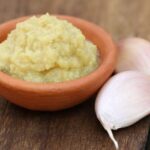 Creamy smoked Chilote garlic paste in a ceramic dish