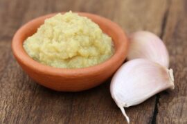 Creamy smoked Chilote garlic paste in a ceramic dish