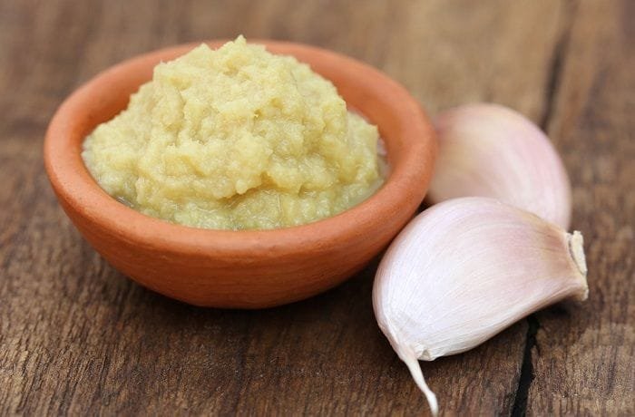 Creamy smoked Chilote garlic paste in a ceramic dish