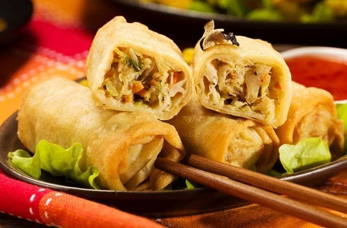 Chilean arrollados primavera, crisp golden fried spring rolls with soy sauce
