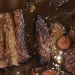 Chilean beef tapapecho slow roasted in red wine sauce, tender and glossy after hours in the oven.