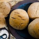 Chilean homemade bread rolls made with toasted flour, with a darker crust and crumb