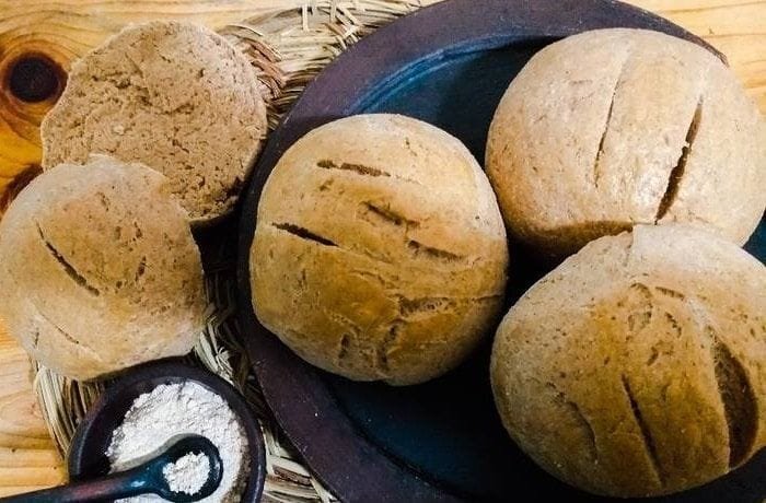 Chilean homemade bread rolls made with toasted flour, with a darker crust and crumb