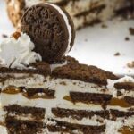 Chilean Tritón cookie cake with layers of whipped cream and chocolate sandwich cookies