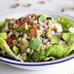 Chilean mote salad with wheat berries, tomato, avocado, and cilantro
