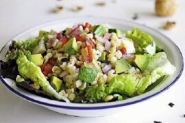 Chilean mote salad with wheat berries, tomato, avocado, and cilantro