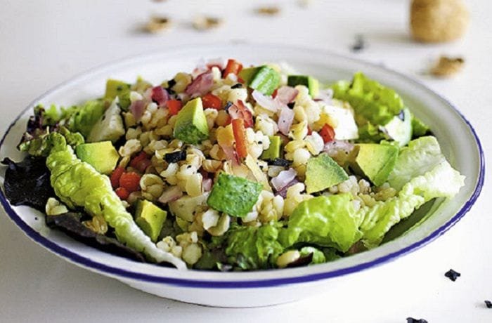 Chilean mote salad with wheat berries, tomato, avocado, and cilantro