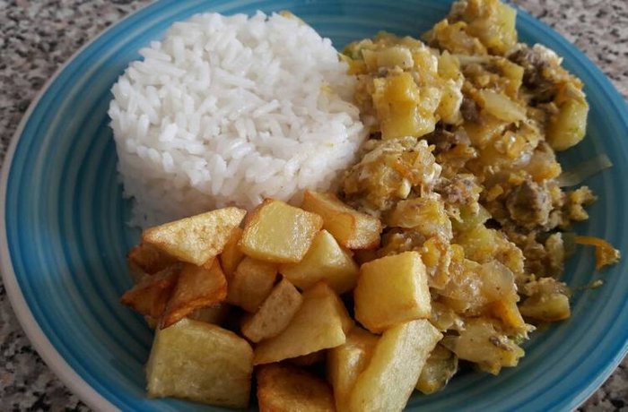 Chilean zucchini stew with ground beef and egg served hot with white rice
