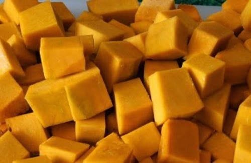 Chopped yellow squash, a key ingredient in the Chilean green bean stew.