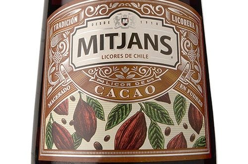 Cocoa liqueur Bottle of cocoa liqueur, the sweet and creamy ingredient that complements the bitters.