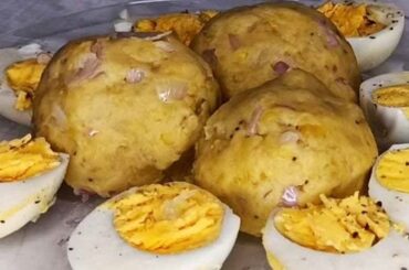 Colombian cabeza de gato, mashed green plantain balls with cheese and egg