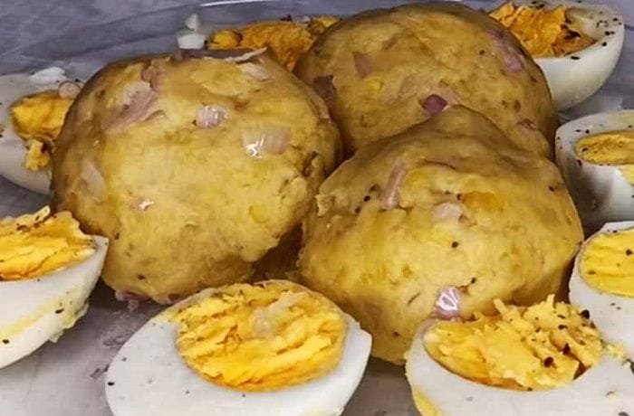 Colombian cabeza de gato, mashed green plantain balls with cheese and egg