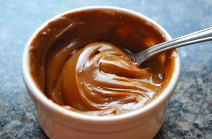 Creamy Chilean manjar, the dulce de leche that binds the layers of the cracker cake