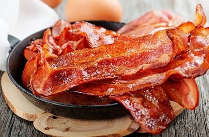 Crispy bacon slices to top the eggs