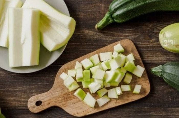 Diced Italian squash (zucchini) for menestron soup.