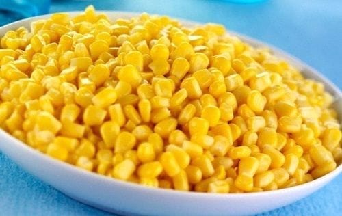 Fresh corn kernels, added toward the end of cooking the Chilean green bean stew.