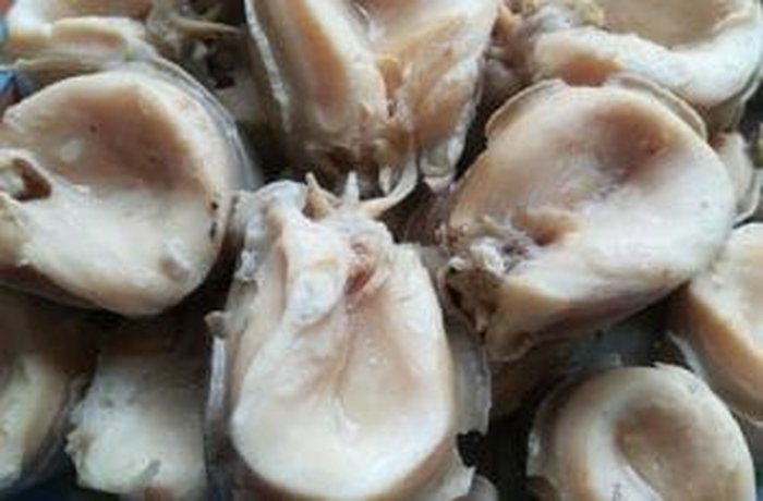 Fresh, cleaned, tenderized Chilean locos ready to be cooked for carbonada.