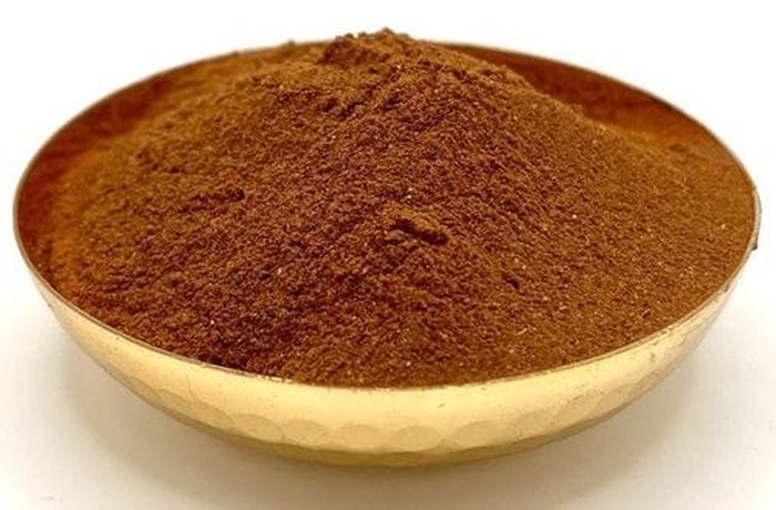 Ground cinnamon to spice the apple cake