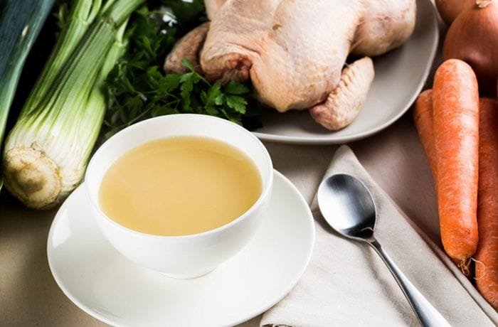 Homemade chicken broth, the base liquid for the pollo al conac sauce.