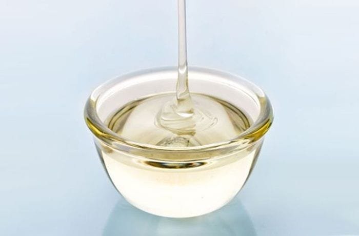 Bottle of homemade gum syrup for cocktails, jarabe de goma