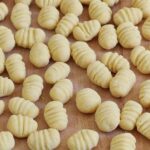 Homemade potato gnocchi served with tomato sauce