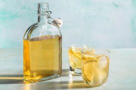 Bottle of homemade triple sec orange liqueur for cocktails