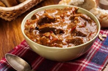 Hungarian beef goulash with paprika sauce and fresh parsley